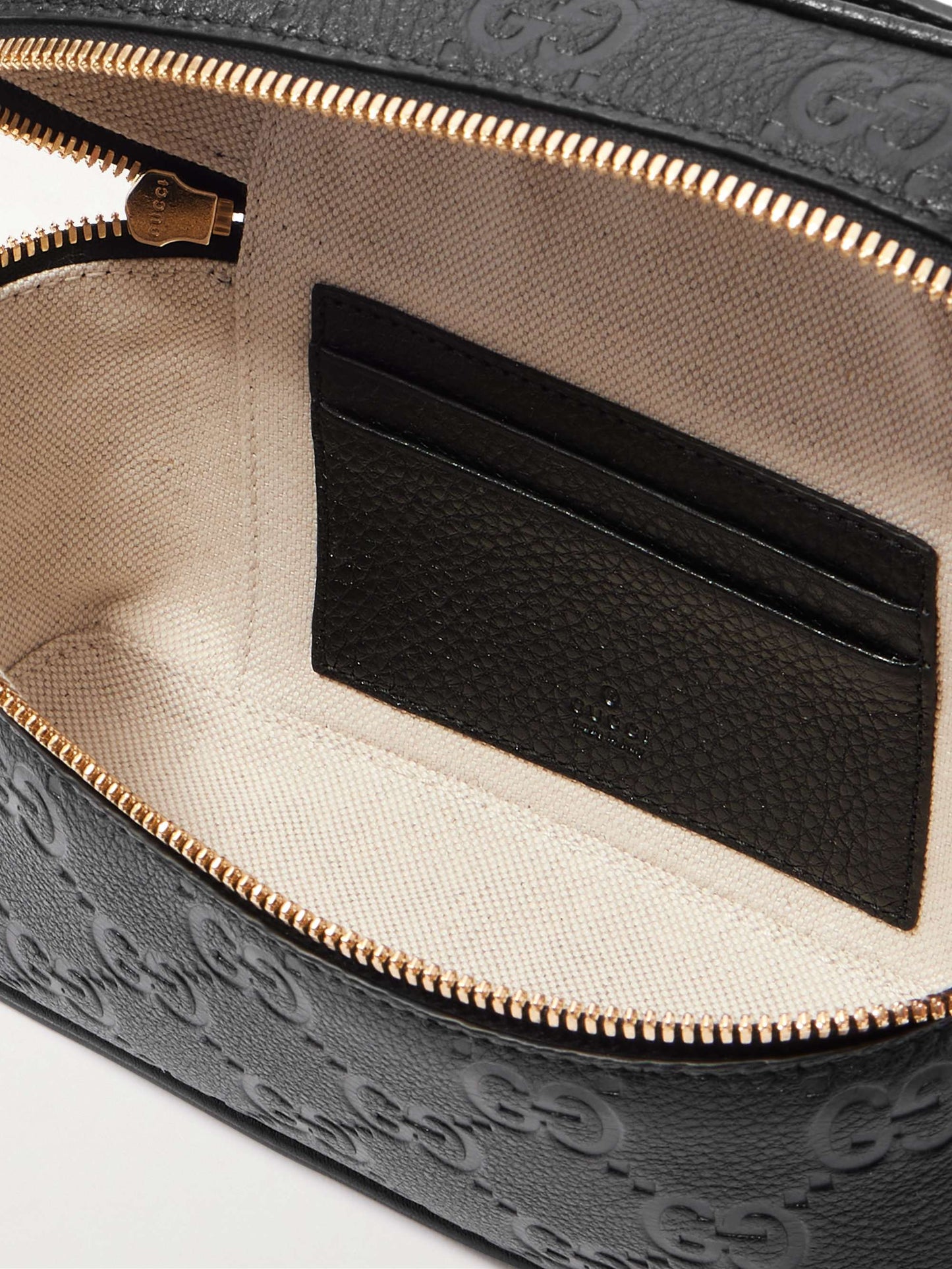 GUCCI GG Emblem mini debossed textured-leather shoulder bag