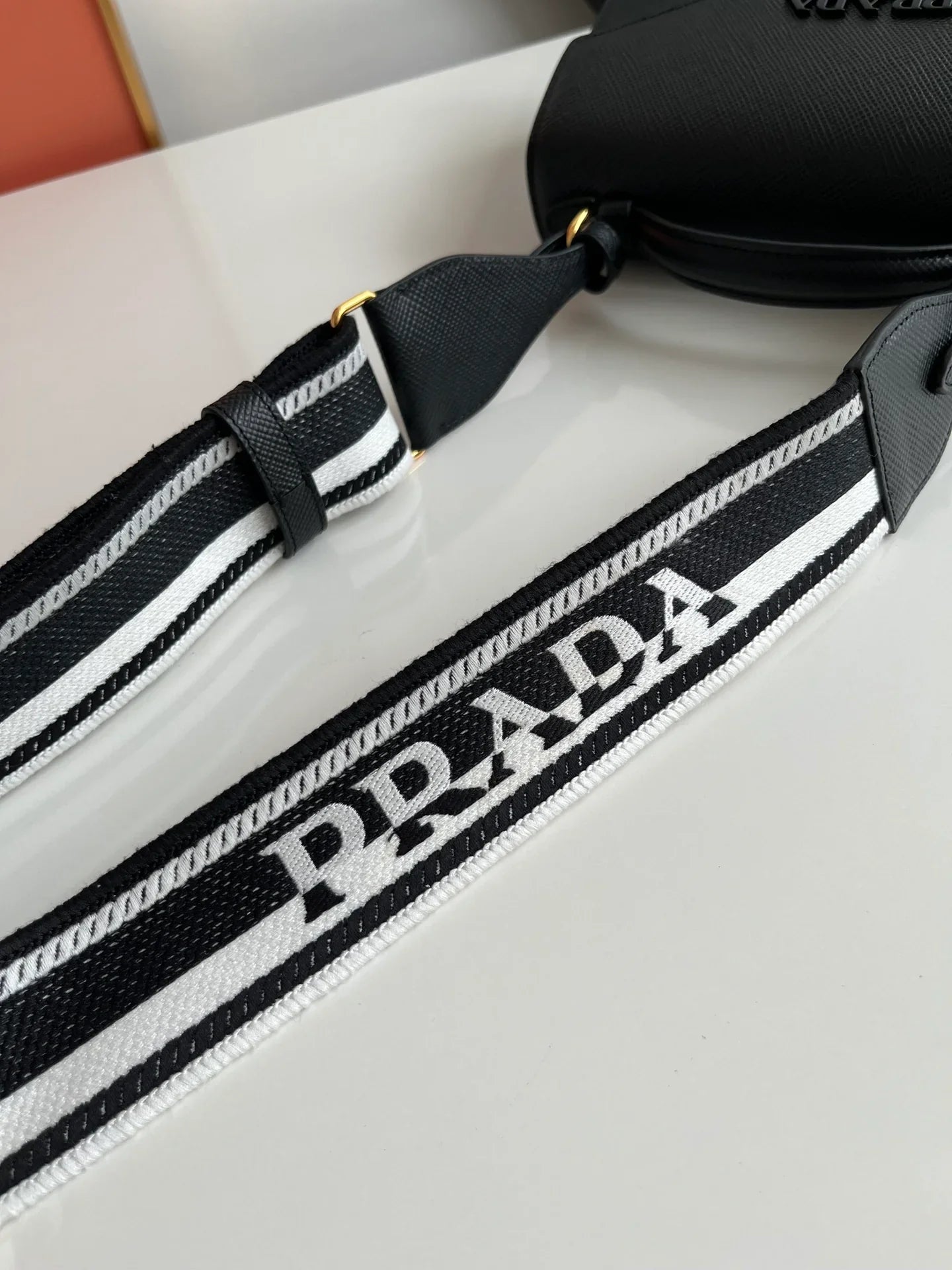 Prada Monochrome Saffiano 21 Leather Bag in Black 21x14x6.5cm