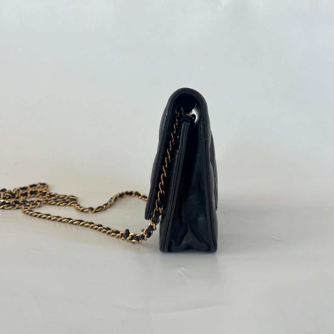 Chanel black quilted lambskin wallet on chain crossbody bag