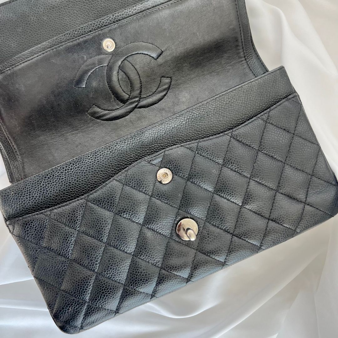 Chanel caviar black flap bag with silver hardware