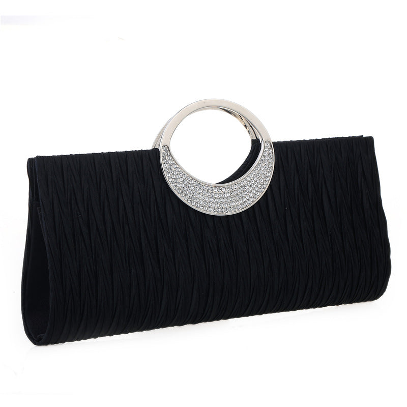 Women's pleated hand-carved evening bag with diamonds