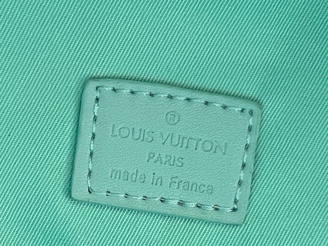 LOUIS VUITTON DISCOVERY BACKPACK CRYSTAL BLUE