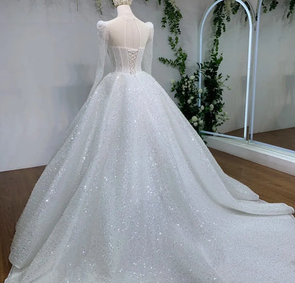 Luxury Ball Gown Wedding Dresses Custom 2025 Arabic Dubai Pearls Illusion Long Sleeves Bridal Gowns Wedding Dress     cg26026