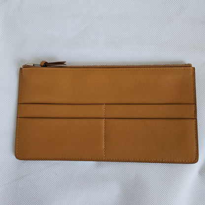 Hermès Yellow Jige Clutch with Gold Leather Zip Pouch