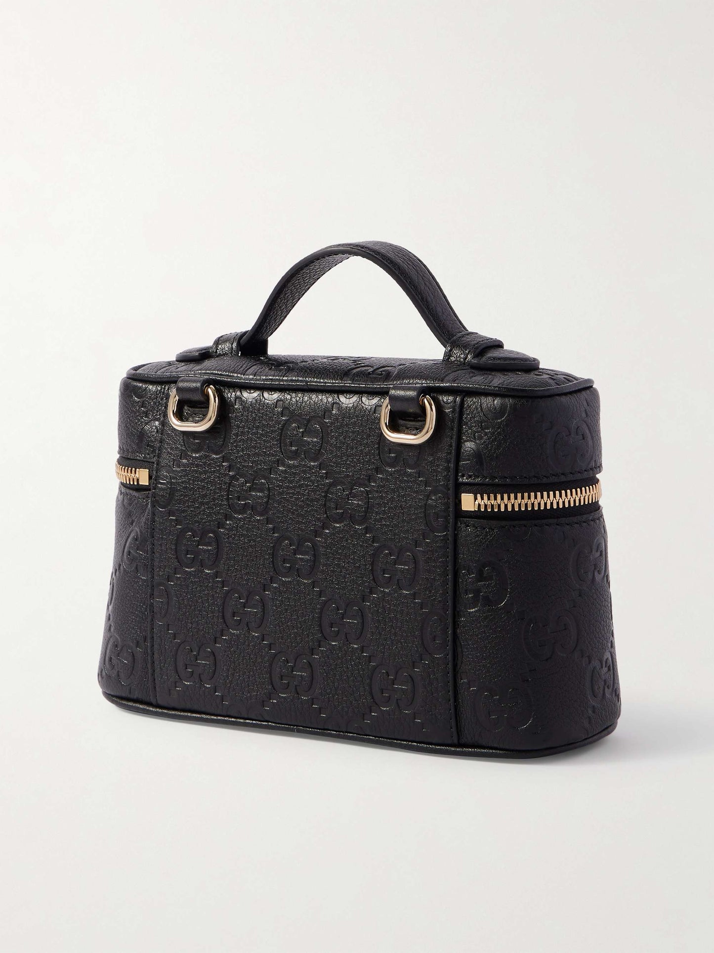 GUCCI GG Emblem mini debossed textured-leather shoulder bag