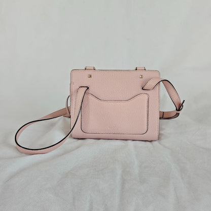 Valentino pink textured leather crossbody flap bag with lock