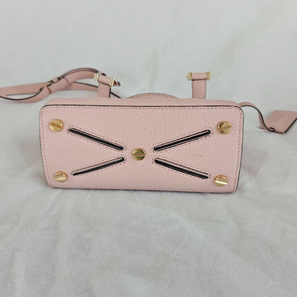 Valentino pink textured leather crossbody flap bag with lock