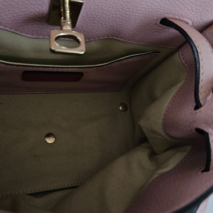 Valentino pink textured leather crossbody flap bag with lock