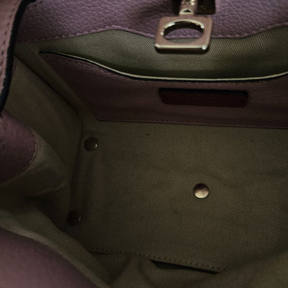 Valentino pink textured leather crossbody flap bag with lock