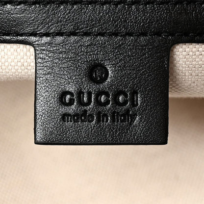 Gucci GG Embossed Duffle Bag