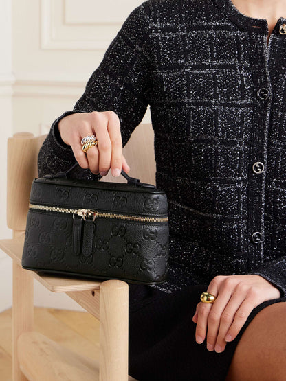 GUCCI GG Emblem mini debossed textured-leather shoulder bag