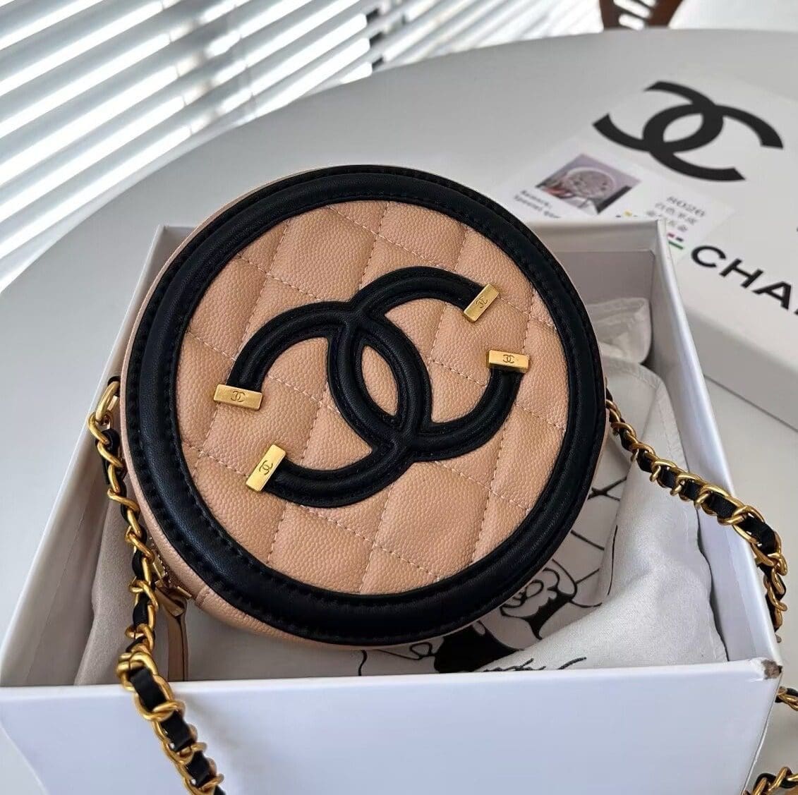 CHANEL Caviar Quilted Round Filigree Crossbody Beige Black