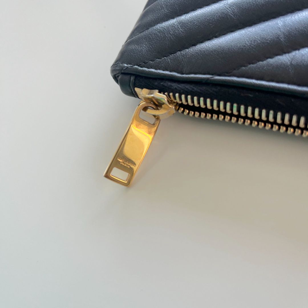 Saint Laurent black quilted leather purse