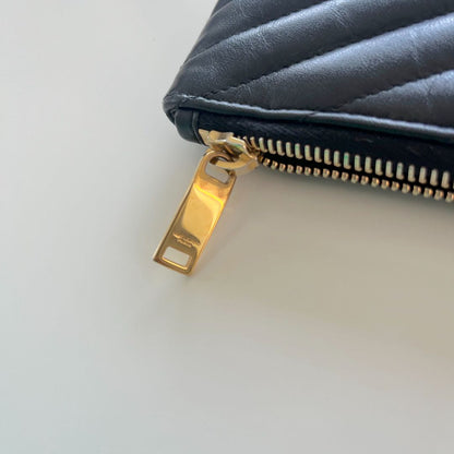 Saint Laurent black quilted leather purse