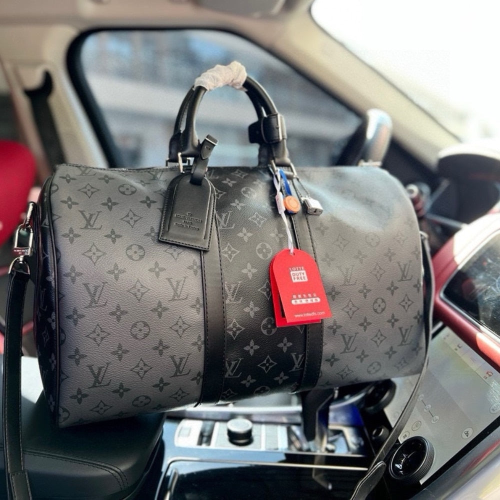 LOUIS VUITTON KEEPALL BANDOULIÈRE 50 MONOGRAM ECLIPSE CANVAS BLACK AND GREY 45CM M45392