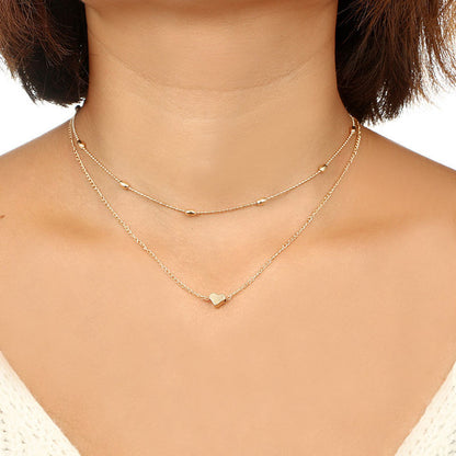 Lovingly simple two-tier brass collar necklace