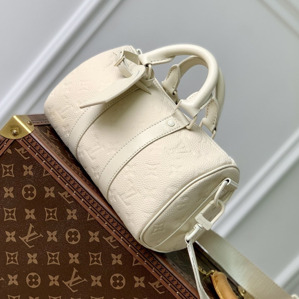 LOUIS VUITTON KEEPALL BANDOULIÈRE 25 BAG CREAM 25CM M24434
