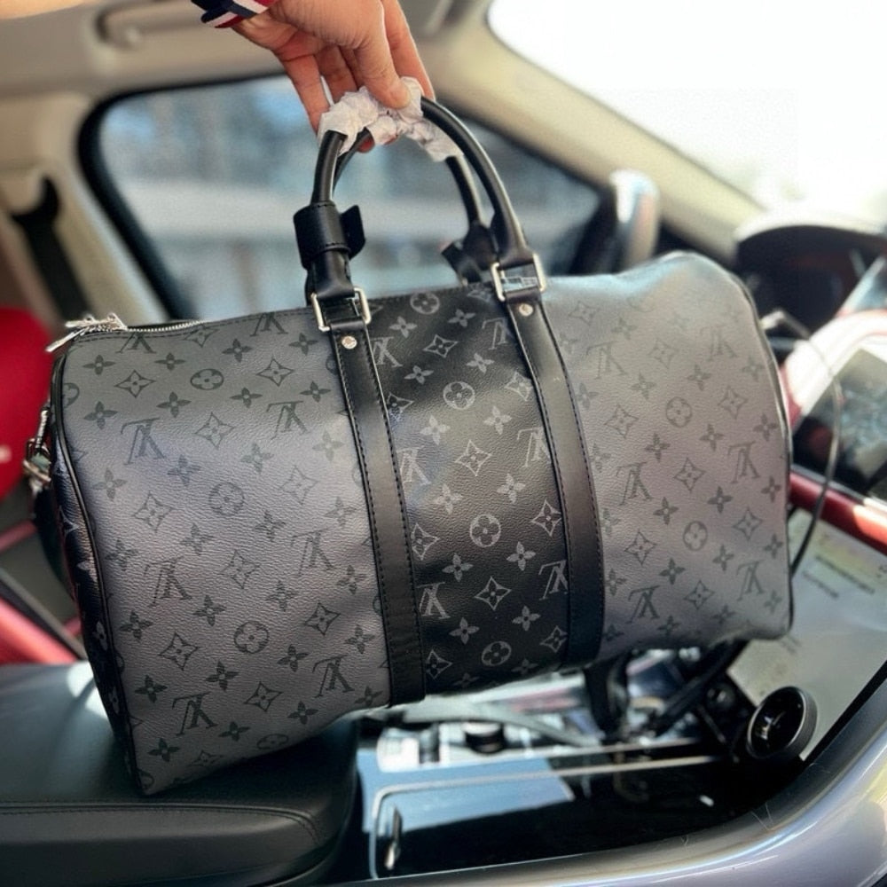 LOUIS VUITTON KEEPALL BANDOULIÈRE 50 MONOGRAM ECLIPSE CANVAS BLACK AND GREY 45CM M45392