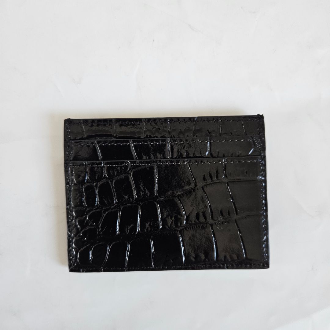 Saint Laurent black crocodile embossed cardholder with gold monogram
