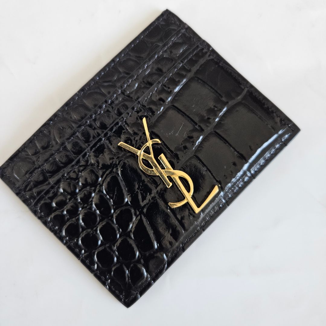 Saint Laurent black crocodile embossed cardholder with gold monogram
