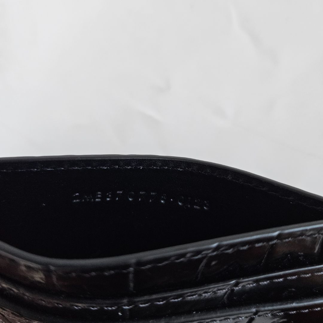 Saint Laurent black crocodile embossed cardholder with gold monogram