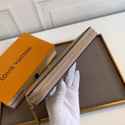 LOUIS VUITTON ZIPPY WALLET MONOGRAM EMPREINTE TURTLEDOVE 19CM M69034