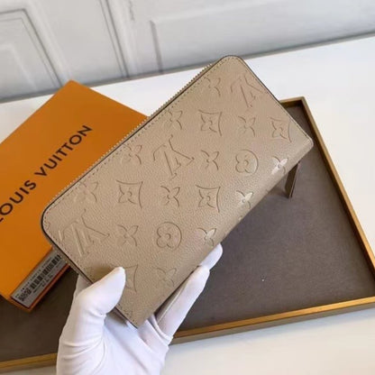 LOUIS VUITTON ZIPPY WALLET MONOGRAM EMPREINTE TURTLEDOVE 19CM M69034