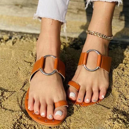 Flat studded beach slippers