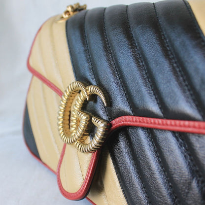Gucci GG Marmont Small shoulder bag in black and beige quilted leather and red piping
