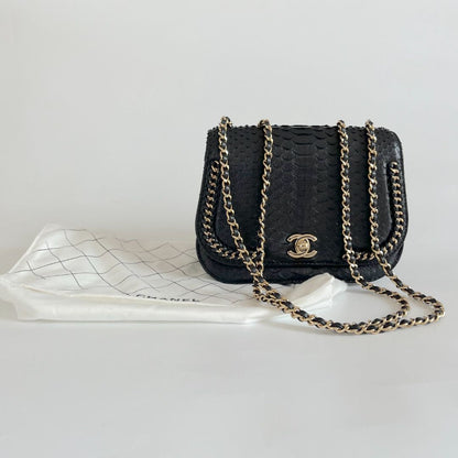 Chanel black braided chic flap bag in python