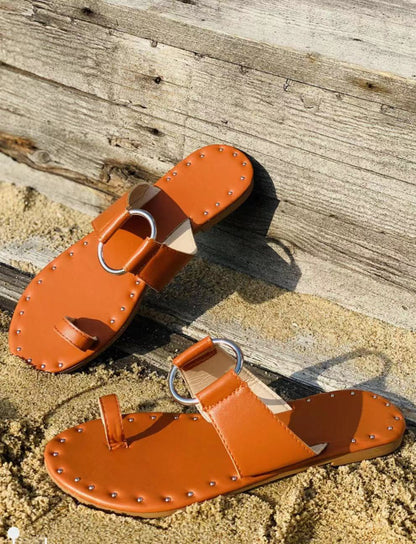 Flat studded beach slippers