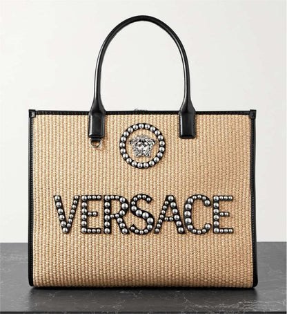 VERSACE Medusa leather-trimmed embellished raffia tote