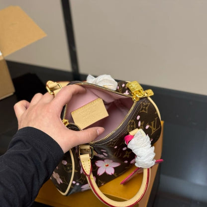LOUIS VUITTON X MURAKAMI SPEEDY BANDOULIÈRE 25 CHERRY BLOSSOM MONOGRAM COATED CANVAS SAKURA BROWN 25CM M14174