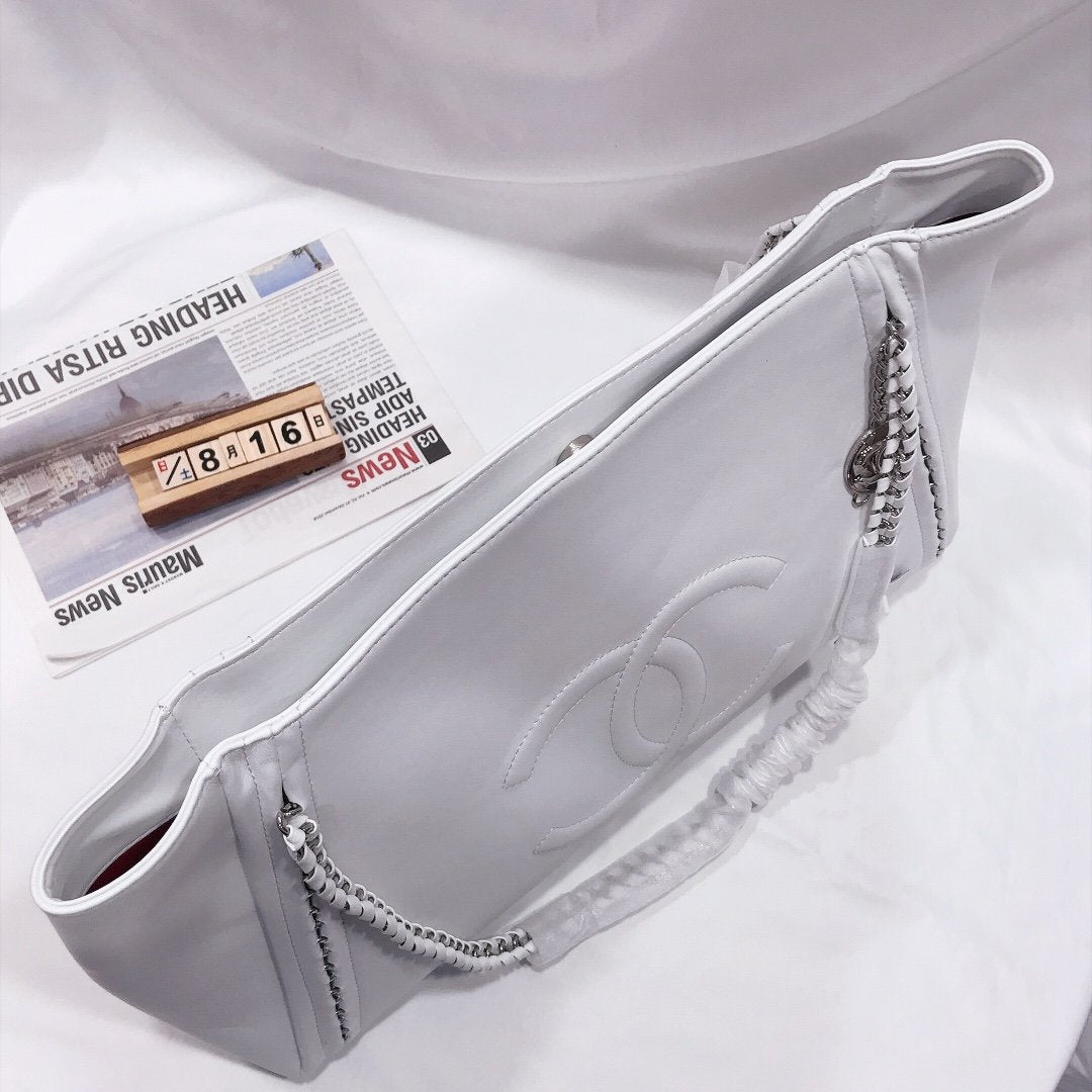 CHANEL CAVIAR MEDIUM STUDDED DEAUVILLE WHITE