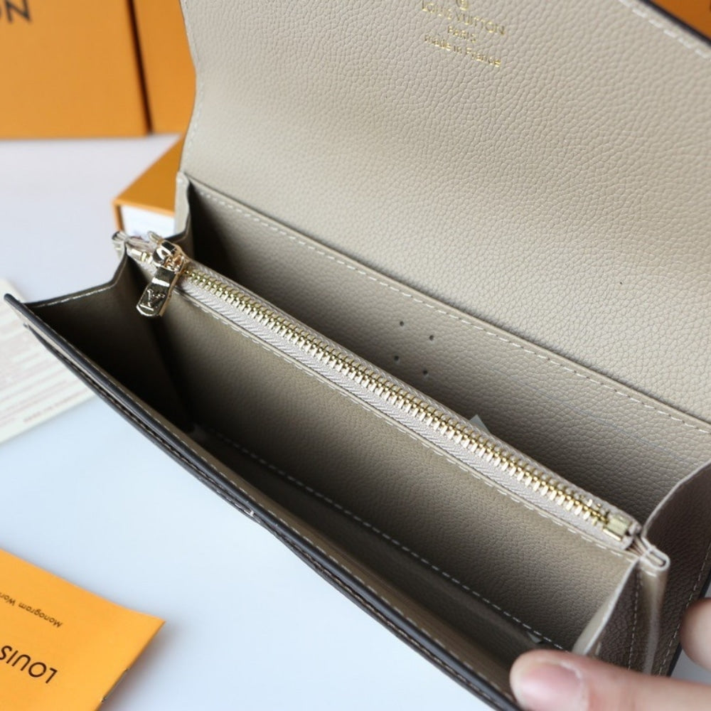 LOUIS VUITTON SARAH WALLET BICOLOR MONOGRAM EMPREINTE TOURTERELLE AND CRÈME 19CM M81049