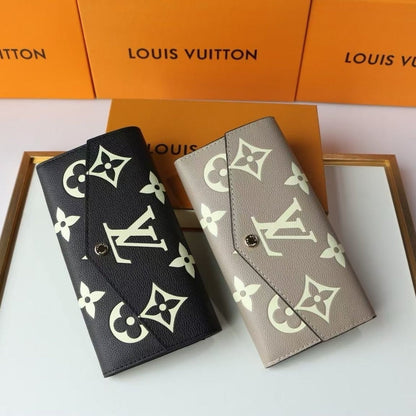 LOUIS VUITTON SARAH WALLET BICOLOR MONOGRAM EMPREINTE TOURTERELLE AND CRÈME 19CM M81049