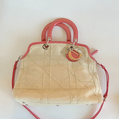 Christian Dior beige canvas with pink python leather trim,