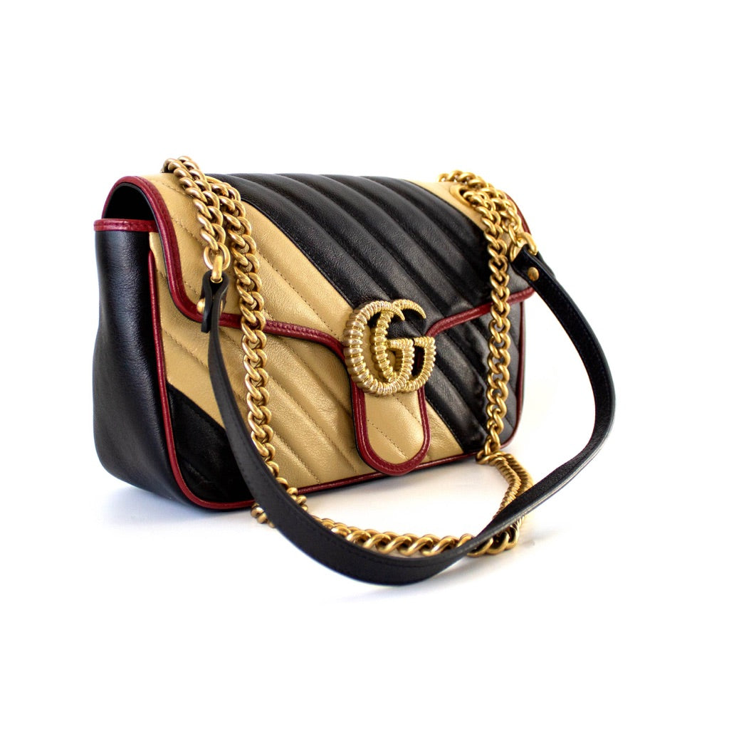 Gucci GG Marmont Small shoulder bag in black and beige quilted leather and red piping