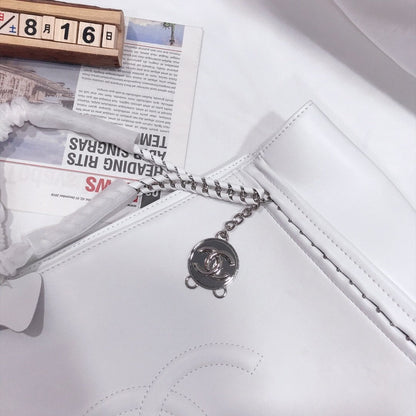 CHANEL CAVIAR MEDIUM STUDDED DEAUVILLE WHITE