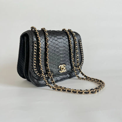 Chanel black braided chic flap bag in python