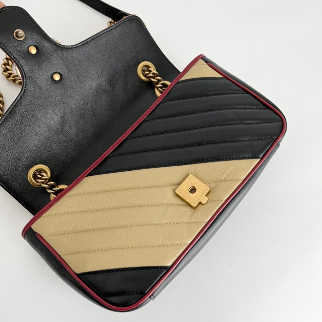 Gucci GG Marmont Small shoulder bag in black and beige quilted leather and red piping