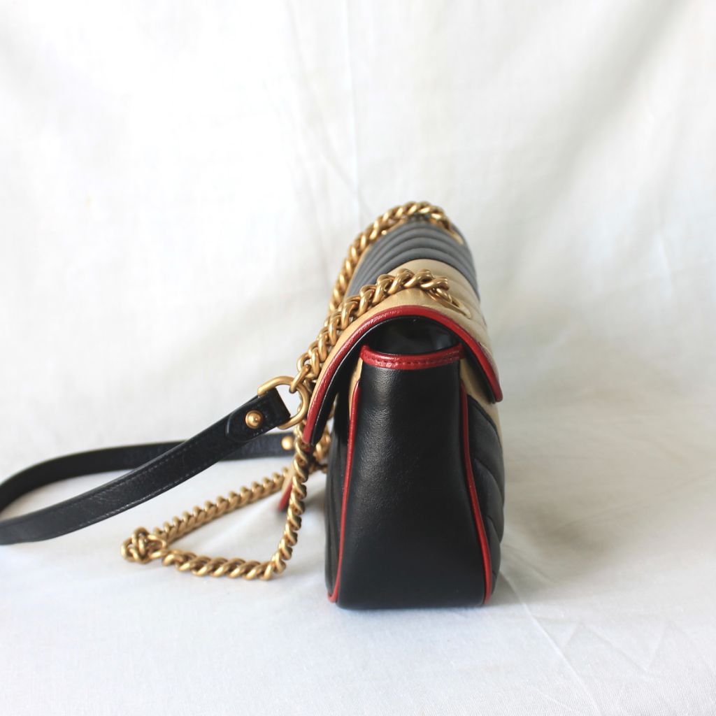 Gucci GG Marmont Small shoulder bag in black and beige quilted leather and red piping