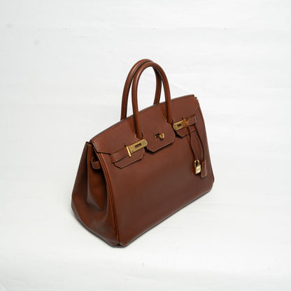 Hermès 35 Ardennes leather Gold