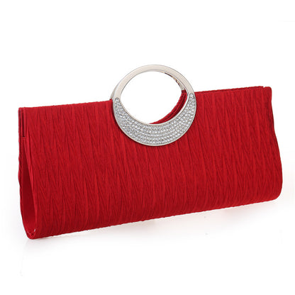 Women's pleated hand-carved evening bag with diamonds