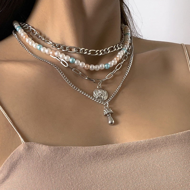 Metal necklace multiple sets of pearls