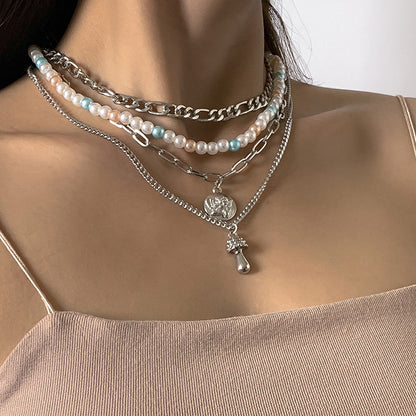 Metal necklace multiple sets of pearls