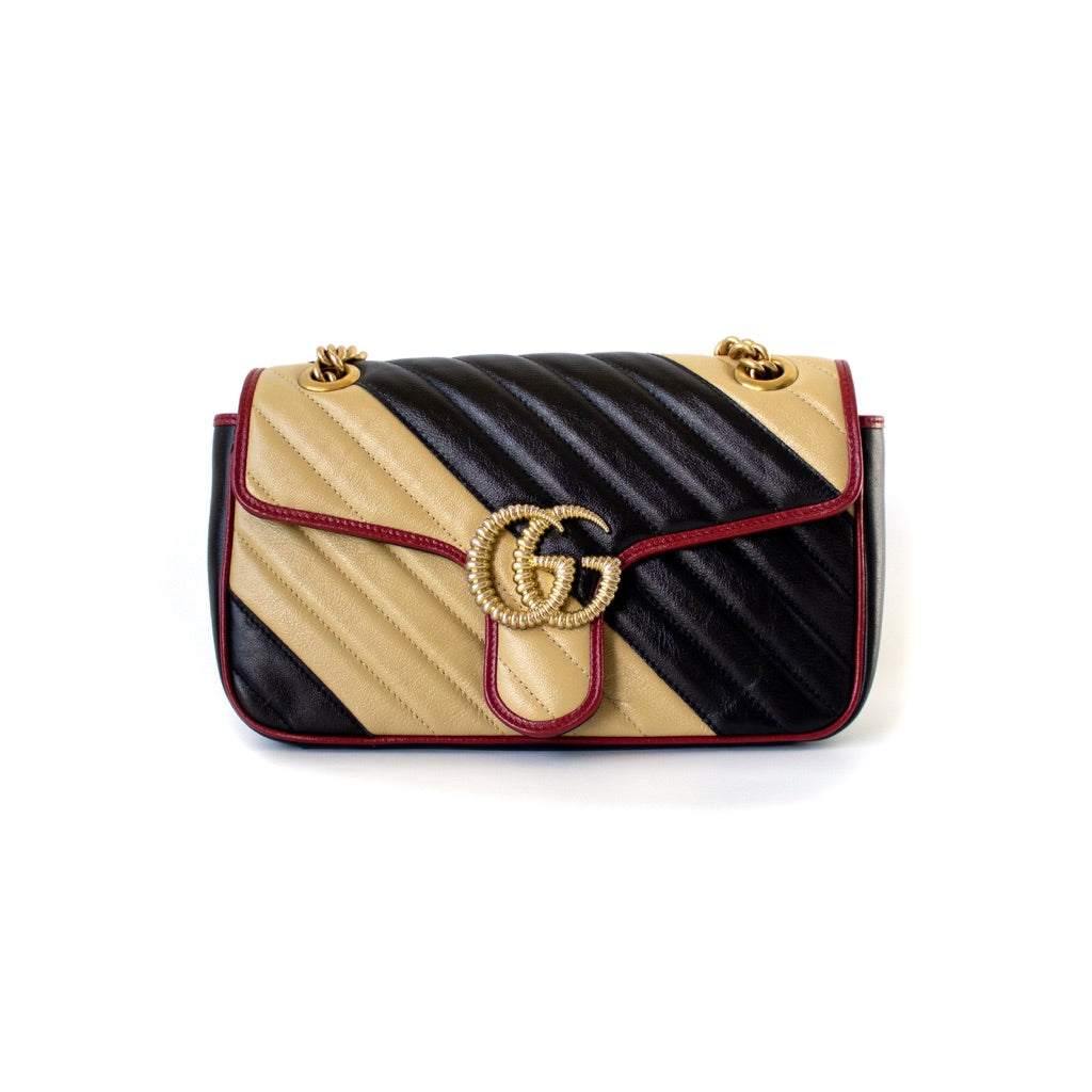 Gucci GG Marmont Small shoulder bag in black and beige quilted leather and red piping