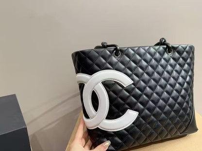 CHANEL Calfskin Quilted Large Cambon Tote Black White
