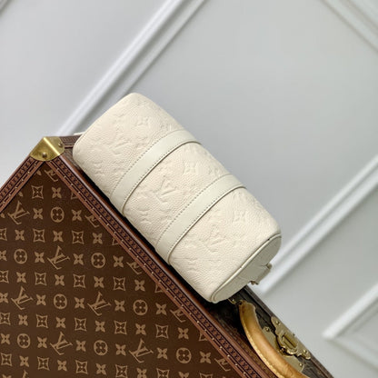 LOUIS VUITTON KEEPALL BANDOULIÈRE 25 BAG CREAM 25CM M24434