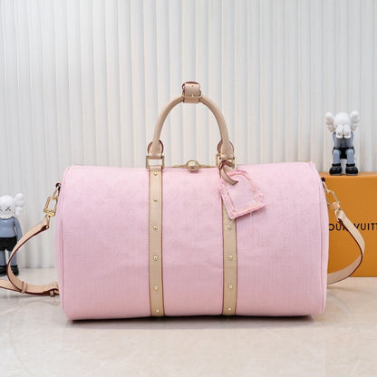 LOUIS VUITTON KEEPALL BANDOULIÈRE 45 DENIM PINK 45CM